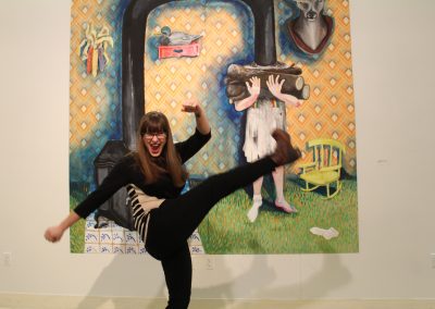 Grad student Rebecca Kautz celebrates installing her MA Show Protagonyst at the Art Lofts Gallery.