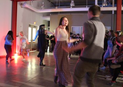 Visitors dance at Matt Mauk and Heather Sutherland's MFA Show Reception at Art Lofts, University of Wisconsin-Madison