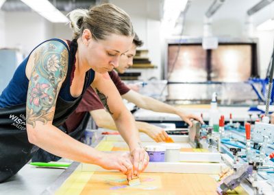 Students work in the printmaking labs in Mosse Humanities Building at the University of Wisconsin-Madison during assistant professor Emily Arthur's Serigraphy course.
