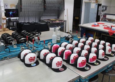 Customized trucker hats sit out to dry at the Serigraphy Lab at the Mosse Humanities Building at the University of Wisconsin-Madison.
