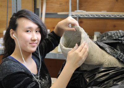 An undergraduate student works on a sculpture at the University of Wisconsin-Madison.