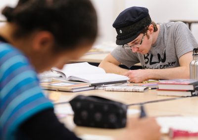 Undergraduate Clay Van Mell works on a drawing during a Making Comics class taught by Lynda Barry at the Mosse Humanities Building at the University of Wisconsin-Madison.