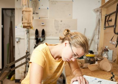 Katie Hudnall, Windgate Artist-in-Residence, sketches ideas for a woodworking project at her studio in the Humanities Building, University of Wisconsin-Madison.