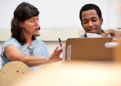 Art Faculty Gail Simpson mentors undergraduate Willie Sinclair about his sketch while teaching a foundations class in the Mosse Humanities Building at the University of Wisconsin-Madison.