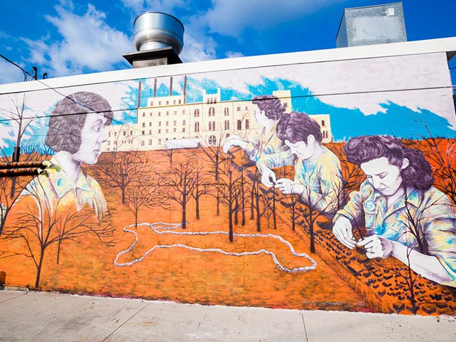 “East Side of Madison” features images of Indian burial mounds, Rayovac workers, the Garver Feed Mill and Freddie Mae Hill, left, the first African American to graduate from UW-Madison.