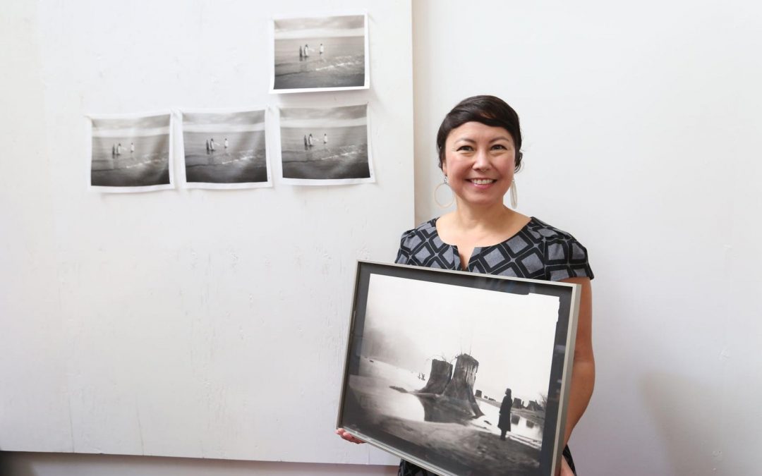 A photo of Professor Tomiko Jones with her photography.