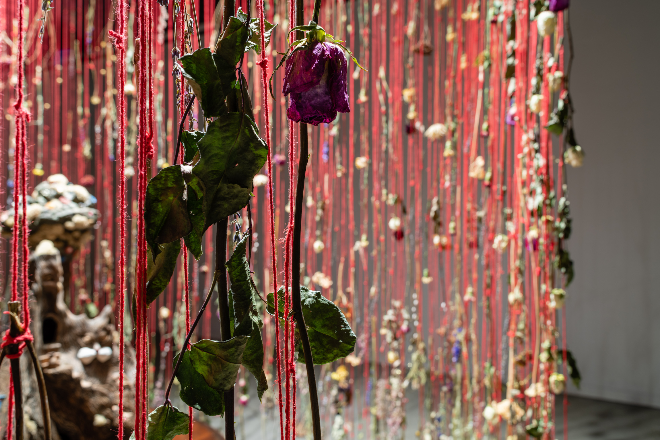 Closeup of the flower veil from Gloriann Langva's Master of Fine Arts exhibition Illusive Charm: Tales of Magic and Dreams at the Art Lofts Gallery, University of Wisconsin-Madison. Photography by Kyle Herrera.