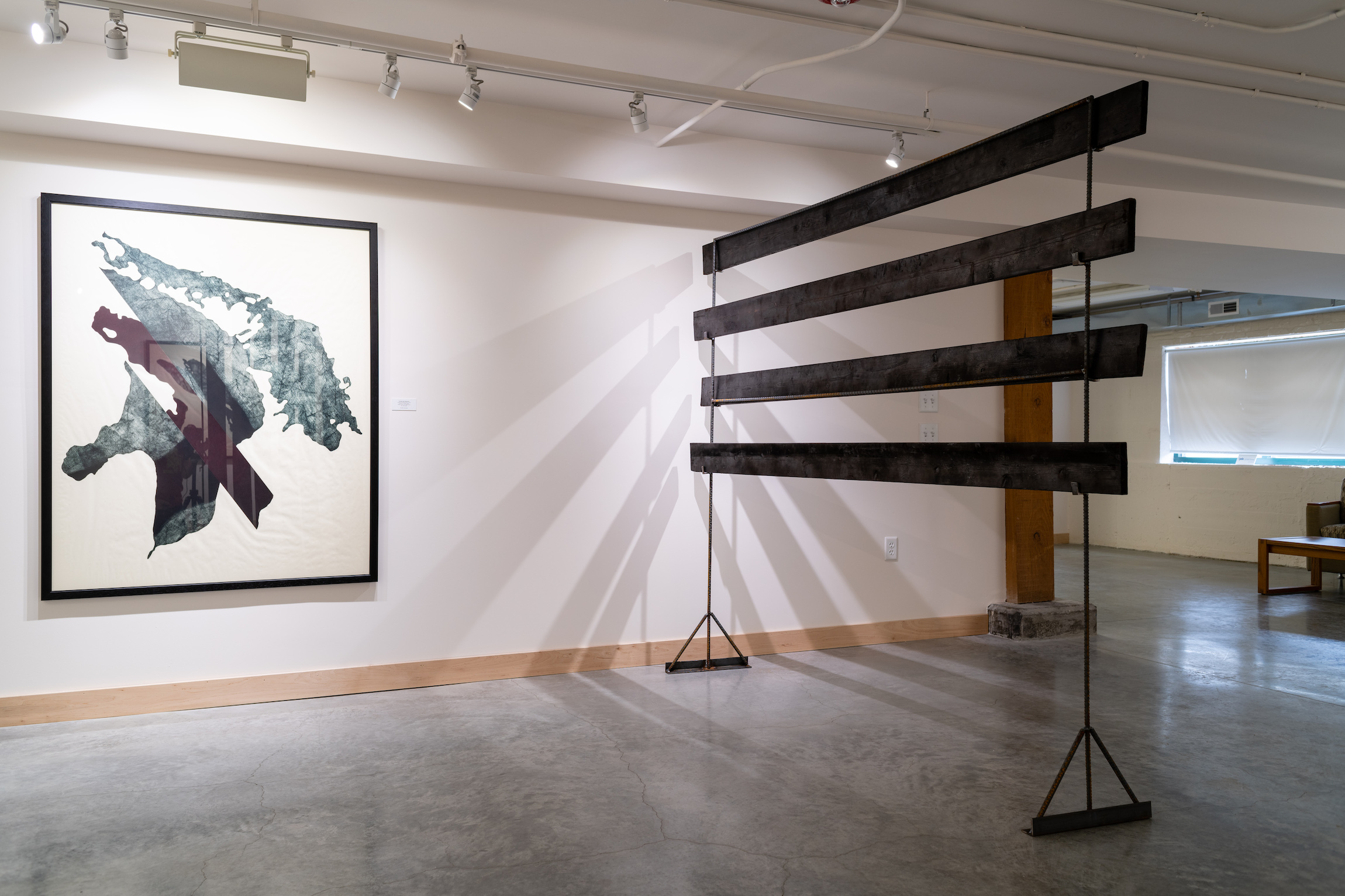 Installation view of Carissa Kalia Heinrichs' Master of Fine Arts exhibition As the Crow Flies at the Apex Gallery of Tandem Press, University of Wisconsin-Madison. Photography by Kyle Herrera.