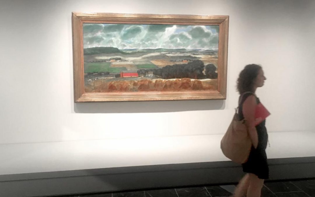 John Steuart Curry's "Wisconsin Landscape," which hangs in the Metropolitan Museum of Art, is among the items that remind visitors to New York about Wisconsin. The painting, which depicts a classic Wisconsin family farm, was created in the late 1930s when Curry was an artist in residence at UW-Madison.