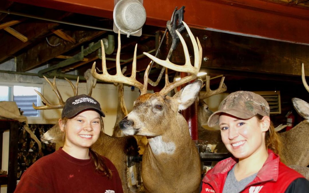 Allison Oskin, left, and Amanda Zmyslo are taxidermists at Outdoor Addiction Taxidermy, a one-stop deer processing shop in Blue Mounds, Wis.
