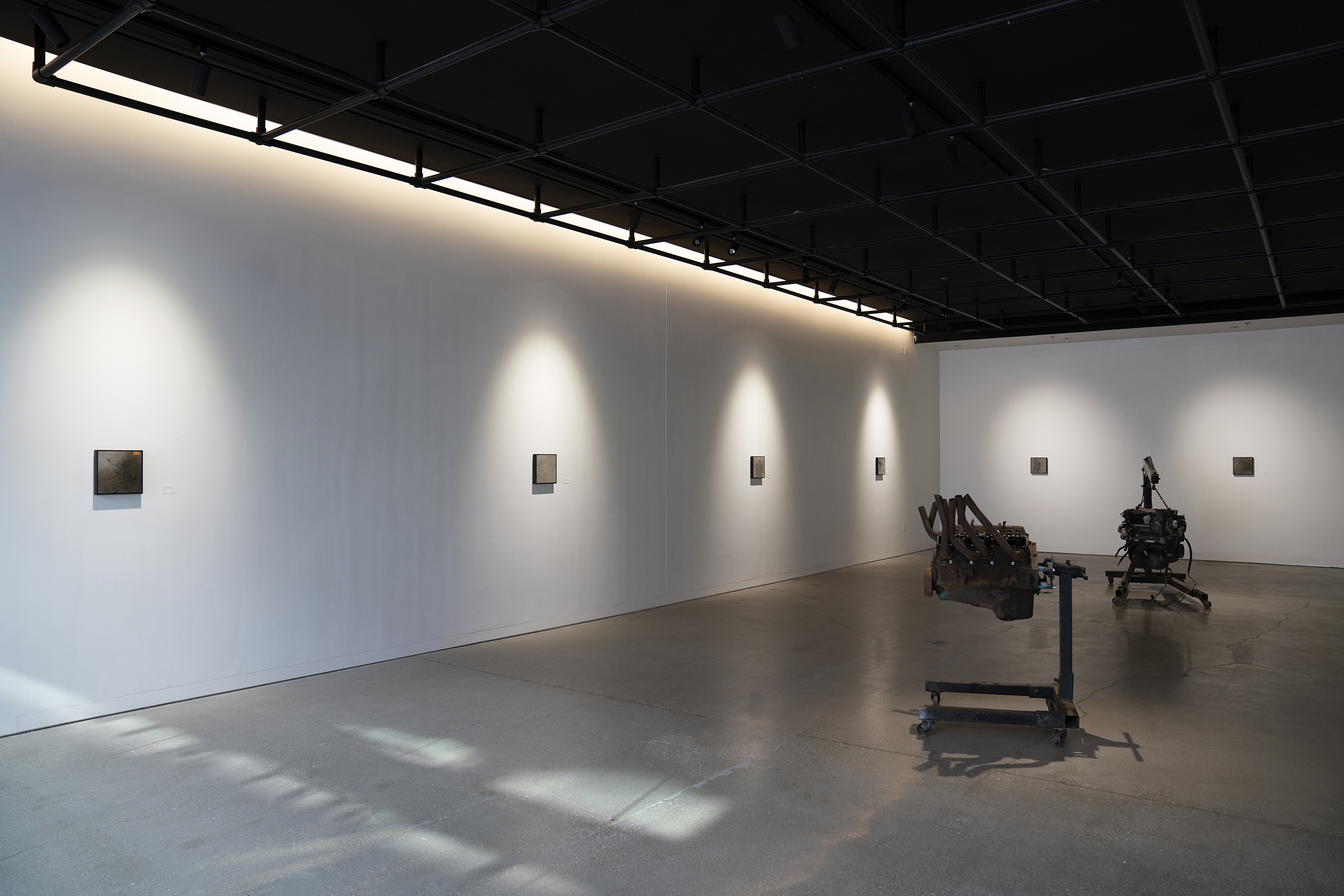 Installation view of Blood, Sweat, and Oil Master of Fine Arts Exhibition by Eric Hazeltine at the Art Lofts Gallery, University of Wisconsin-Madison.