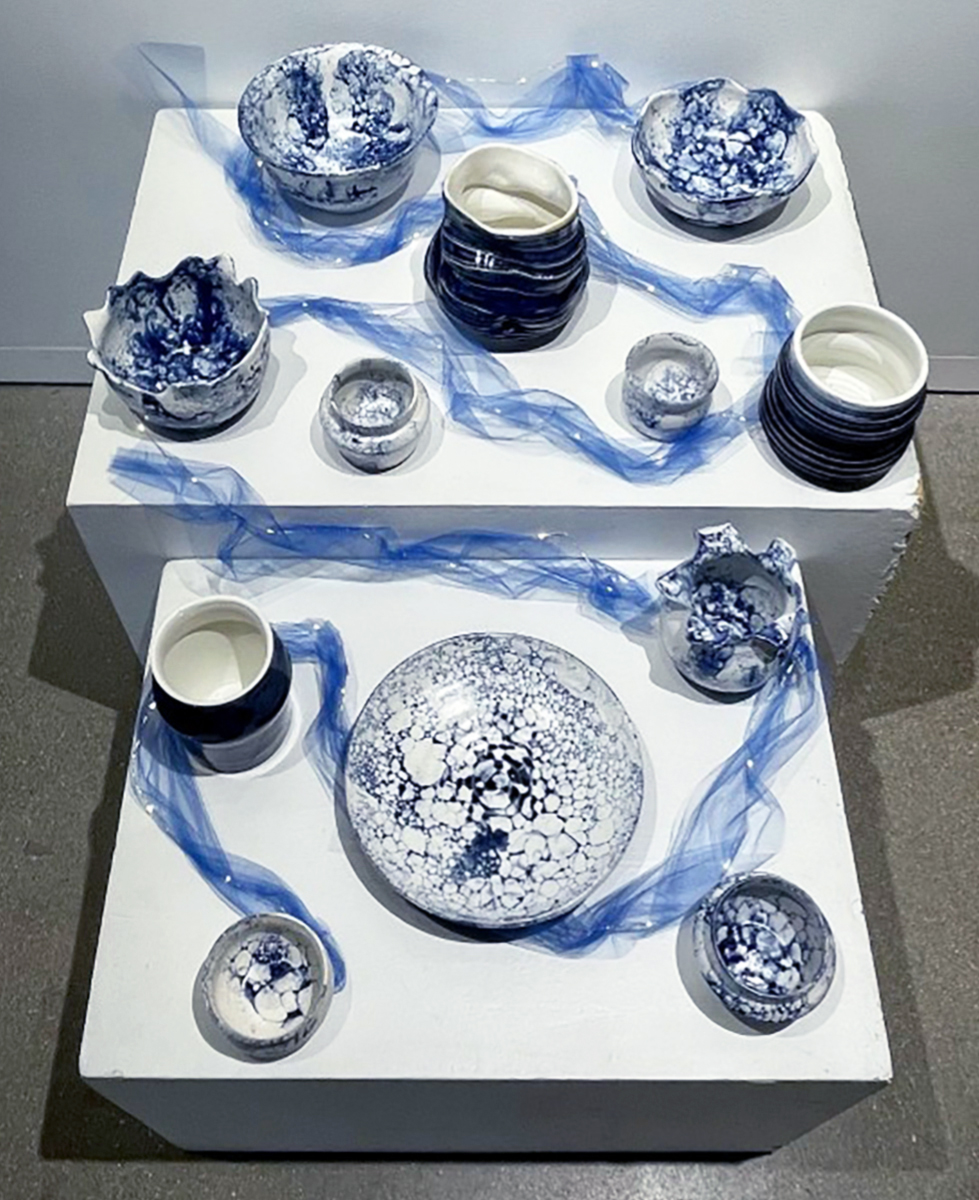 Installation birdseye view of vessels from Chasing A Reservoir of Ghosts glazed cone 6 stoneware exhibition by Kennedy McCarthy.