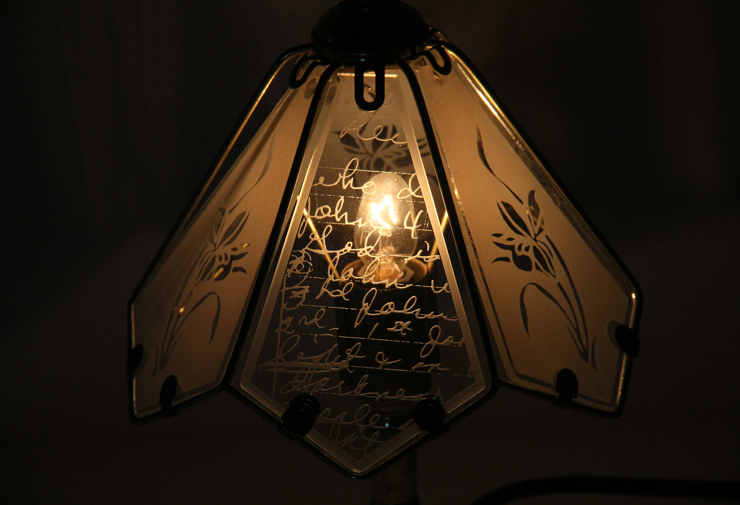 In God She Saw The Light detail, touch lamp with sandblasted sheet glass by Bre'Annah Stampley.