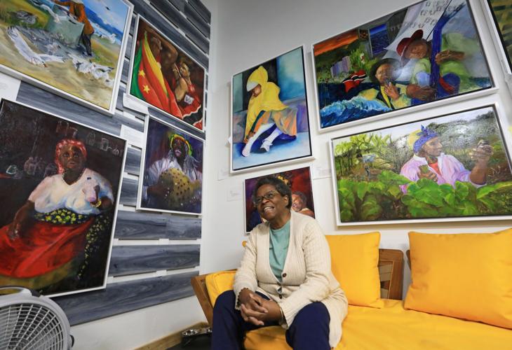 Paintings inspired by her native Trinidad line the walls of artist Mary Gill's Atwood Avenue studio. "Everything here has a story," Gill said. "I keep on going back to Trinidad all the time."