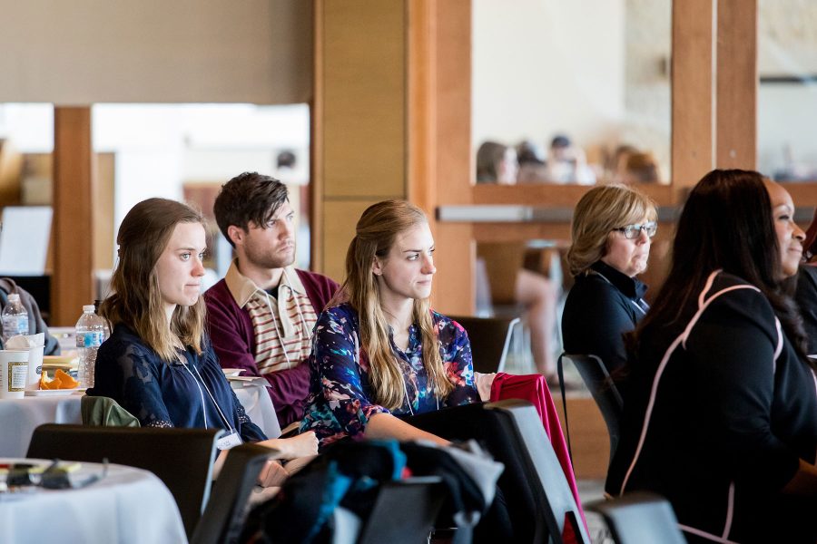 Attendees at a professional learning program listening to a speaker (speaker not pictured)