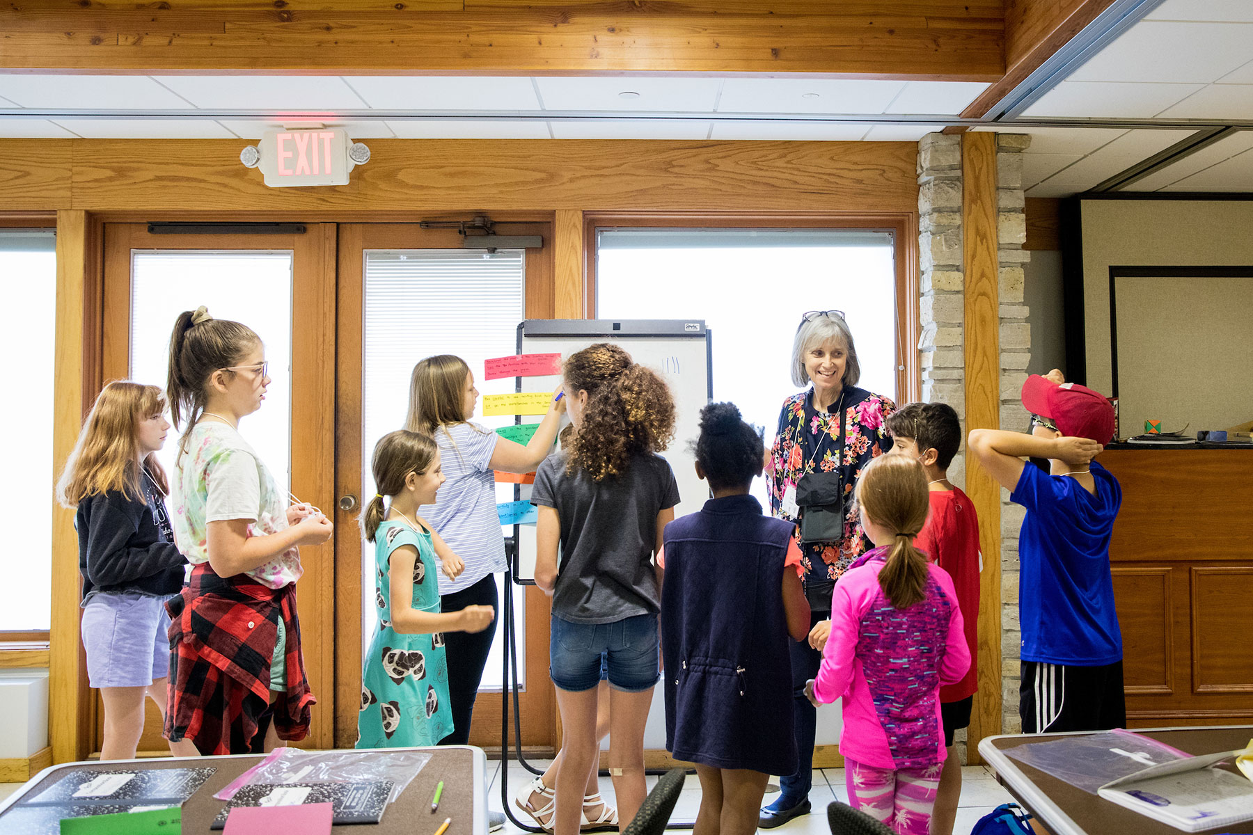 Participants at the Young Writers Camp at Olbrich Gardens working on an idea board