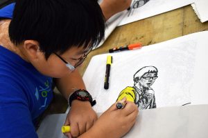 Student drawing in FauHaus workshop