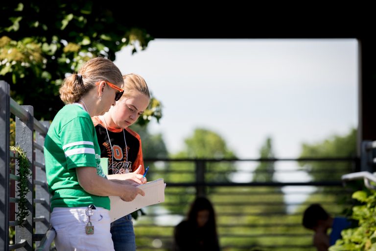 A student discusses with her mentor